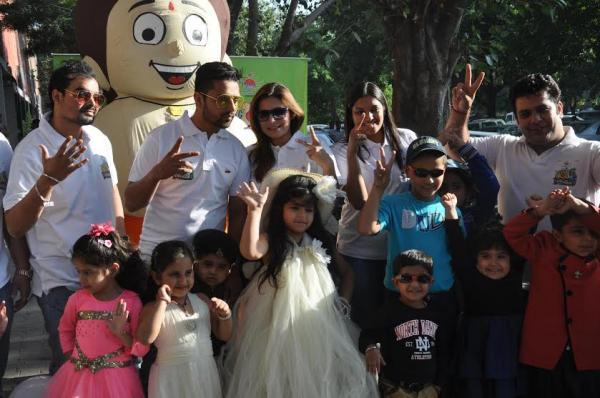 Some of the children who will be participating in Kids Carnival 2014 pose with organisers and Chhota Bheem at an event that took place in Chandigarh. 